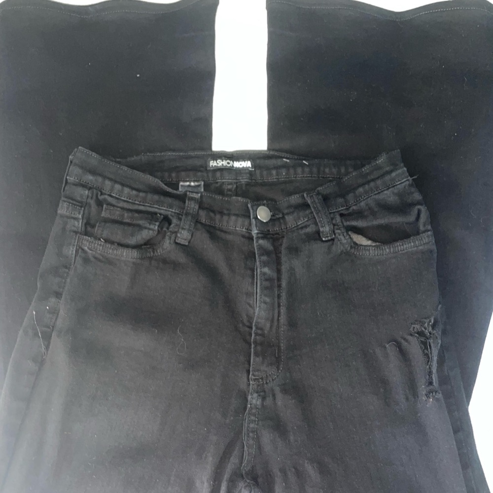 Fashion Nova black bootcut jeans with distressed knees